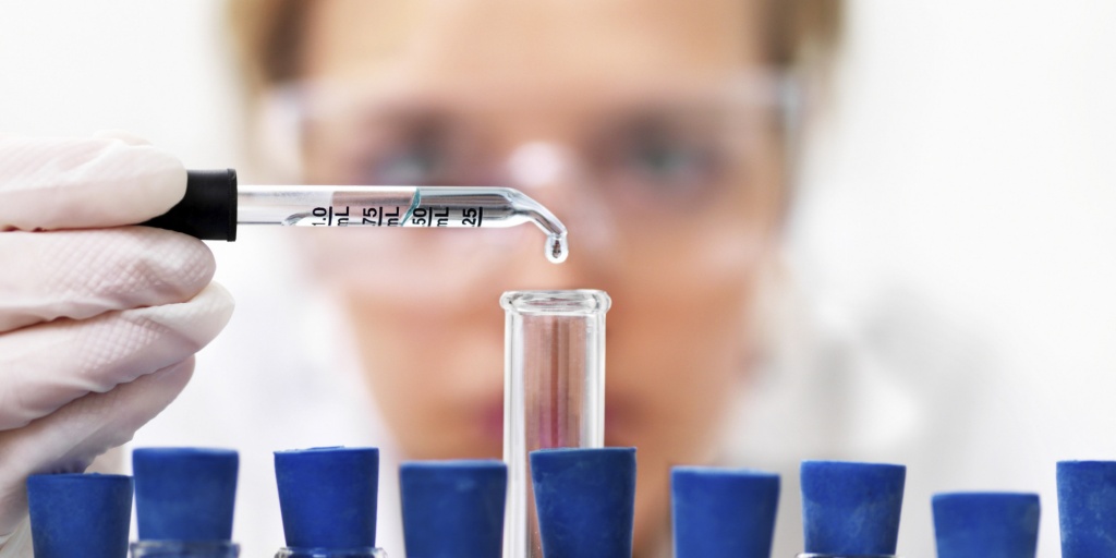 Researcher working with chemicals
