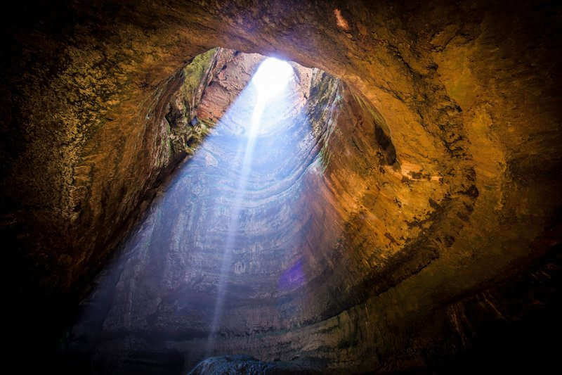 Light radiates through the caves in the Baatara Gorge in Lebanon - the spectacular view