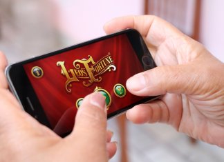 person-playing-app-on-mobile-phone