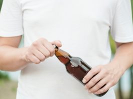 how to open a bottle without a bottle opener